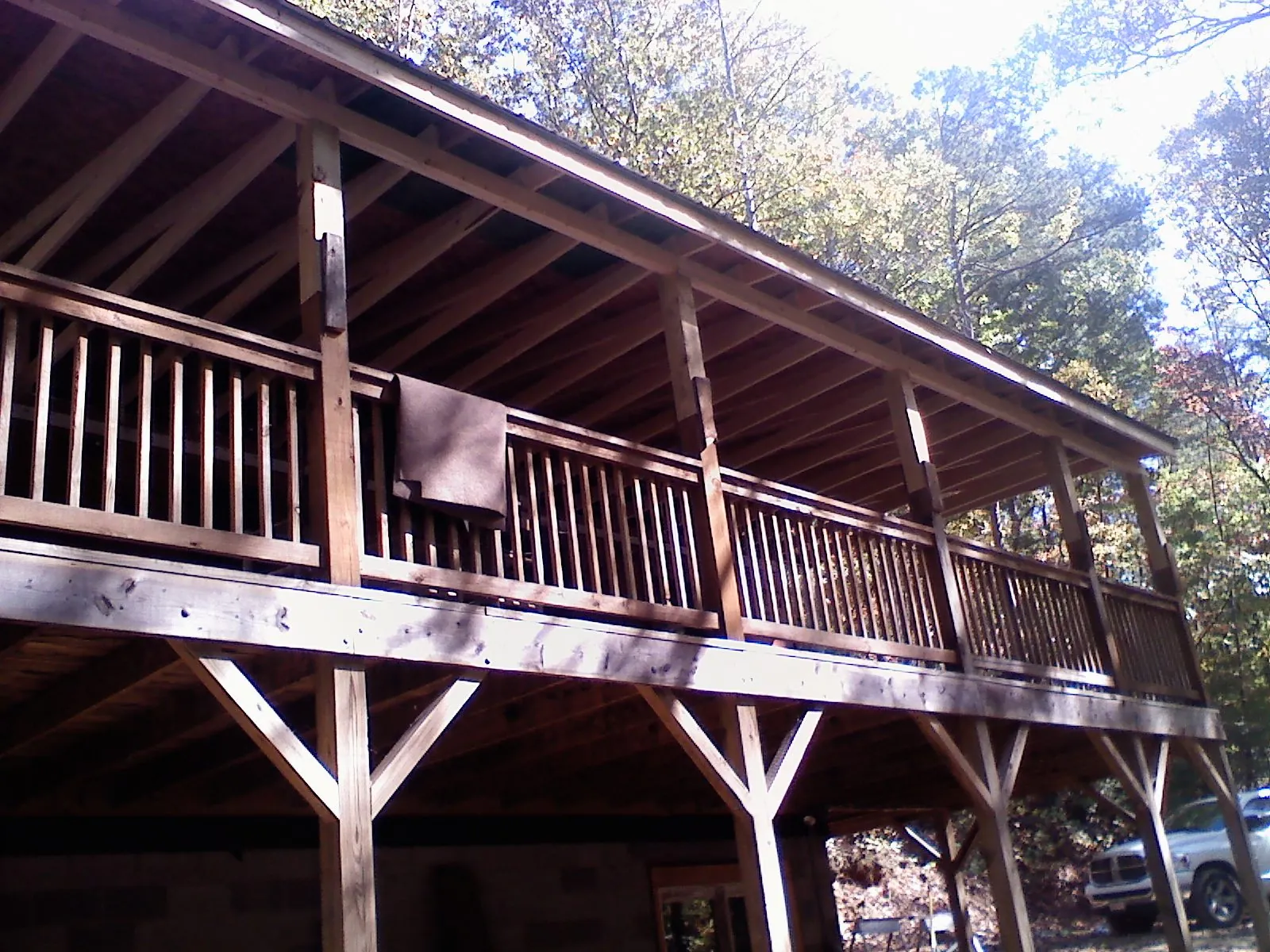 Timber framing under a new elevated porch and deck — Roof Leak Repair in Oak Hill by Roofing Brothers